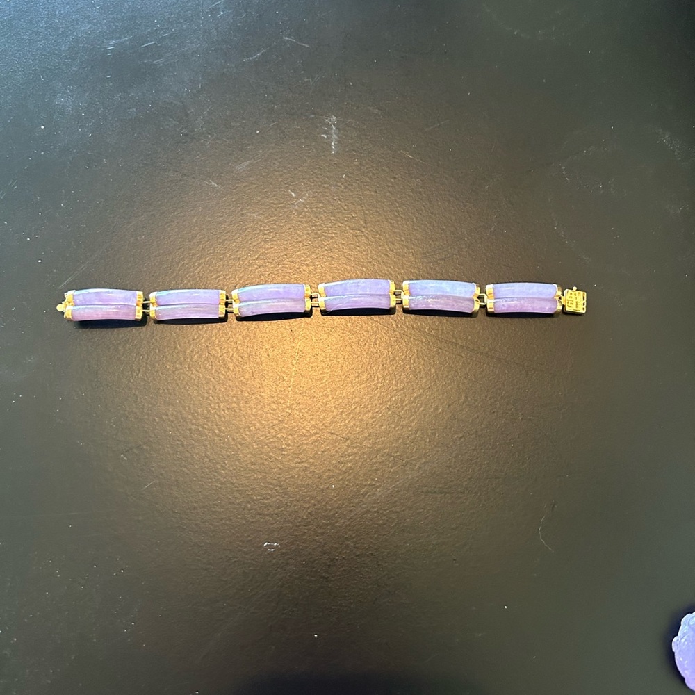 7 inch Jade bracelet with 14 my gold clasp.